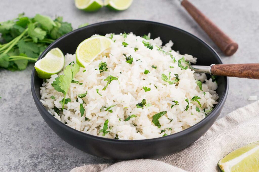 cilantro and lime rice in a black bowl