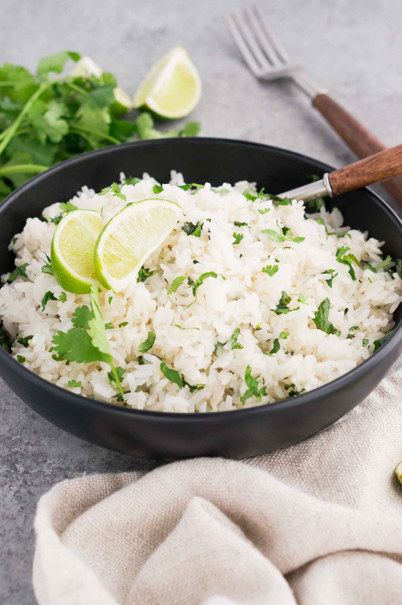 cilantro rice with lime in a black bowl
