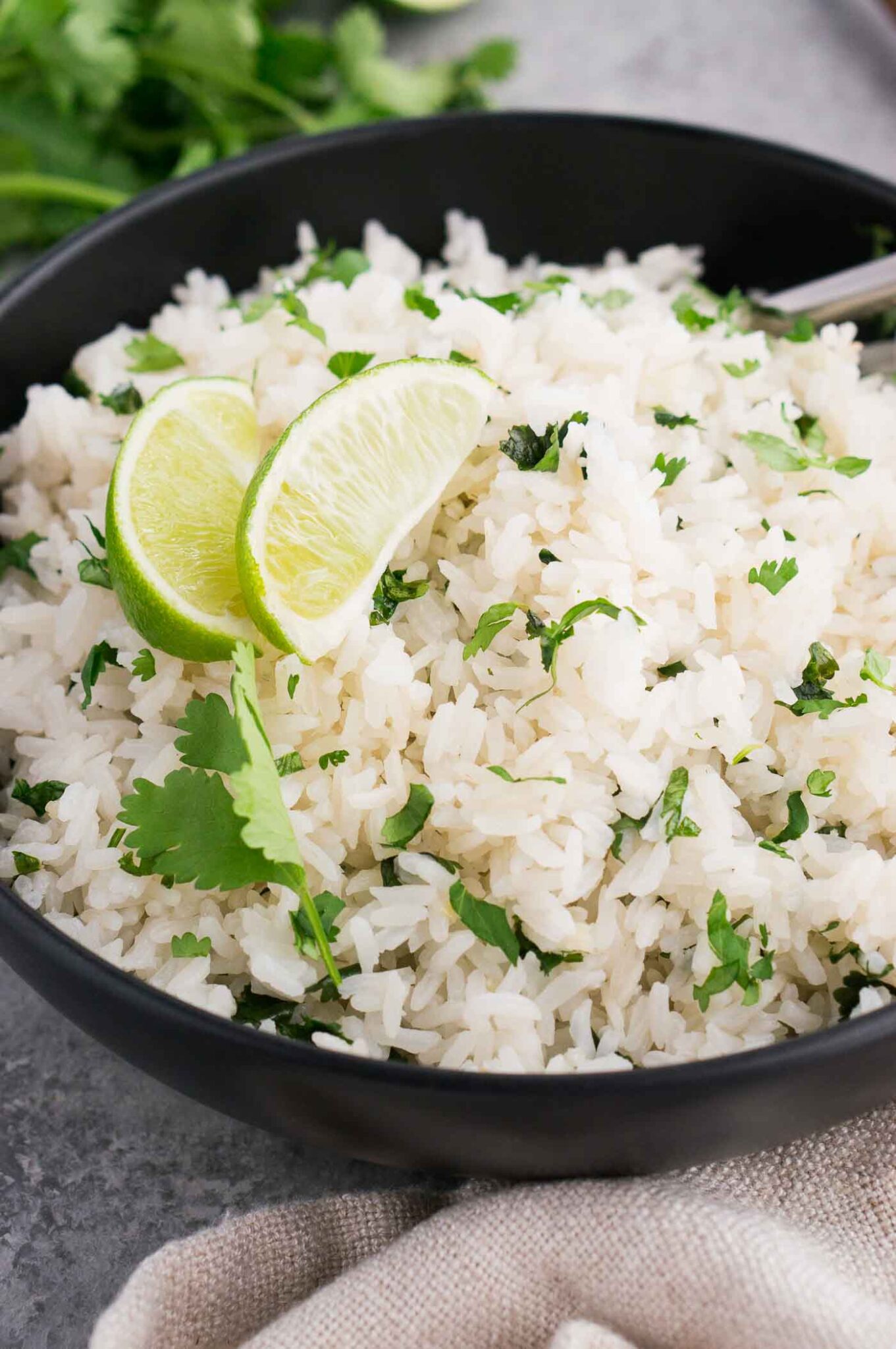 close up image of rice with lime and cilantro
