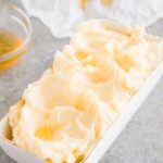 close up image of whipped butter with honey