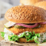 fish burger with tartar sauce and fixings