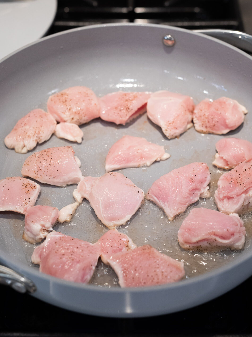 cooking chicken in a skillet
