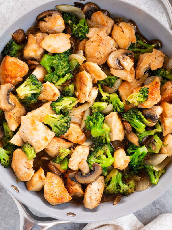 chicken and broccoli stir fry in a skillet