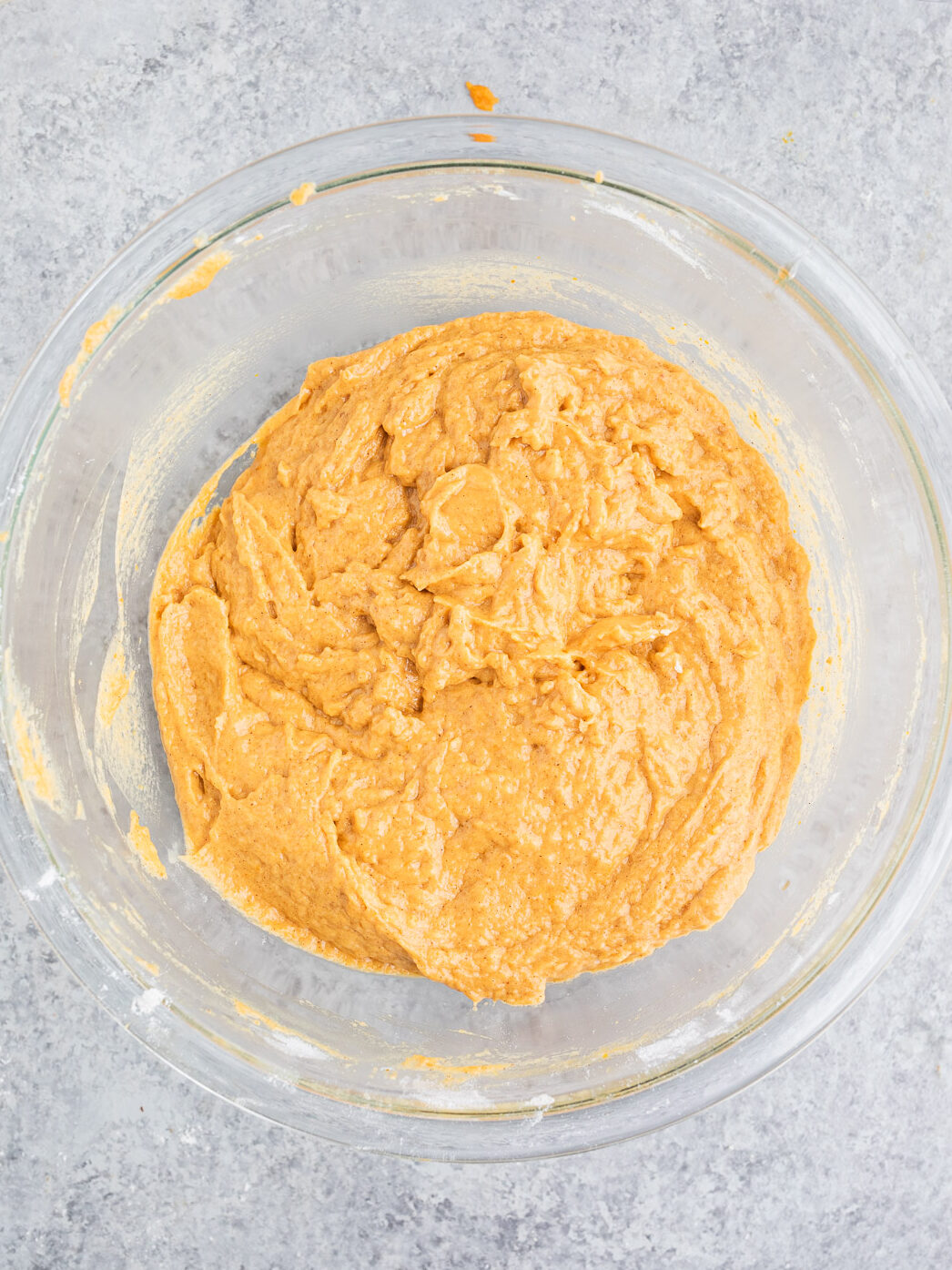 combining wet and dry ingredients for pumpkin muffins