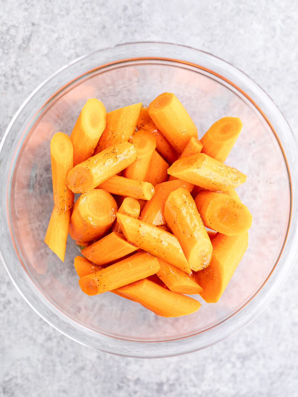 coated carrots with glaze in a glass bowl
