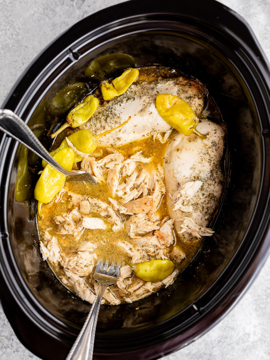 shredding Mississippi chicken in the crock pot