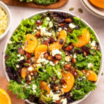 citrus salad with mixed greens in a bowl
