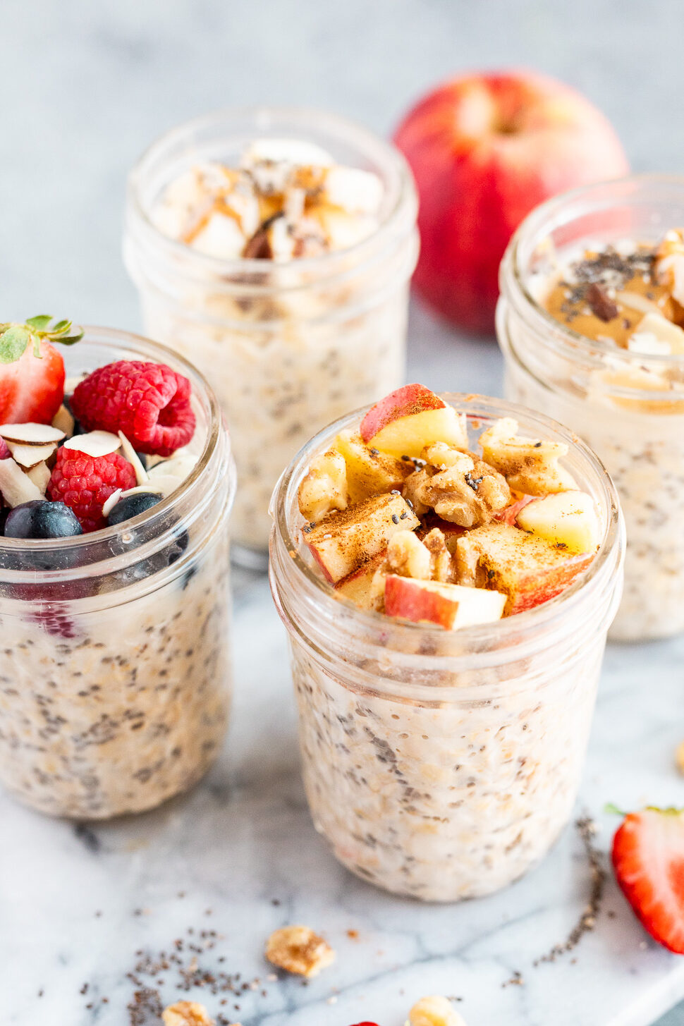 Close-up of creamy overnight oats made with rolled oats and chia seeds, showing thick texture after chilling overnight.