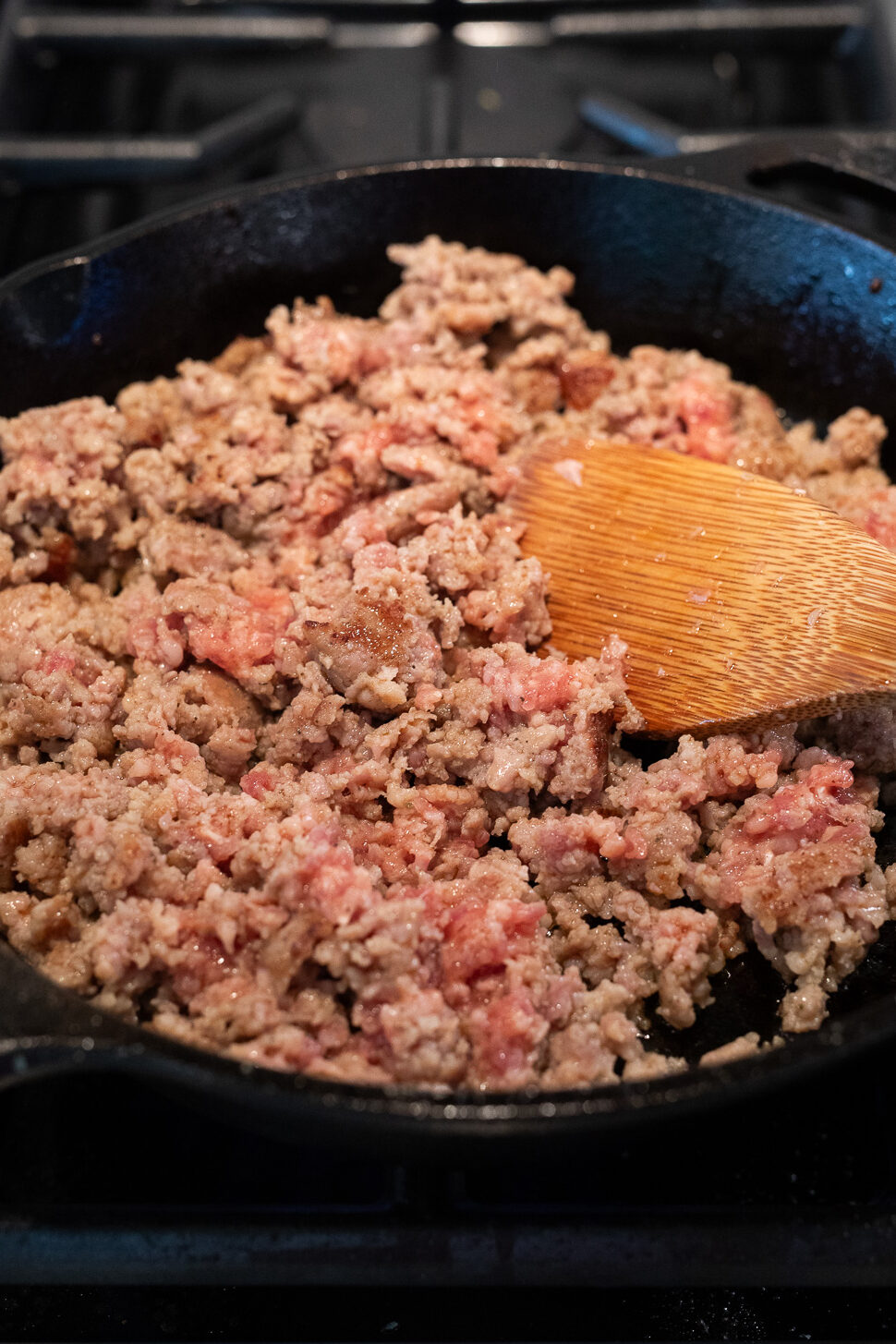 Browning sausage in a skillet for sausage egg breakfast biscuits
