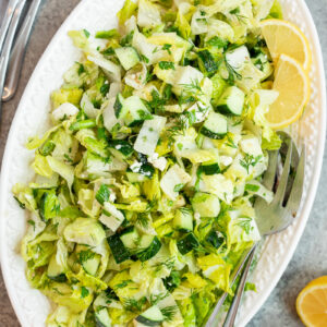 Maroulosalata Recipe (Greek Lettuce Salad) with chopped lettuce, cucumber, fresh herbs and tangy vinaigrette