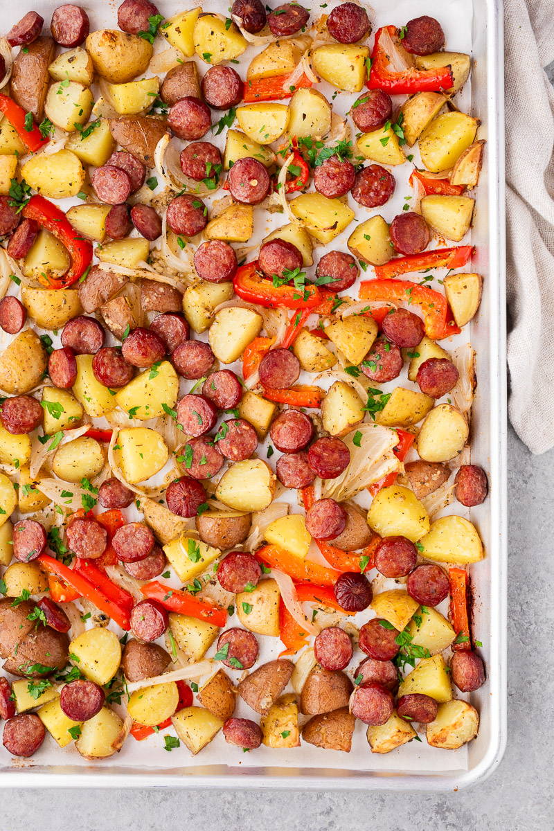 roasted sausage and potatoes on a sheet pan