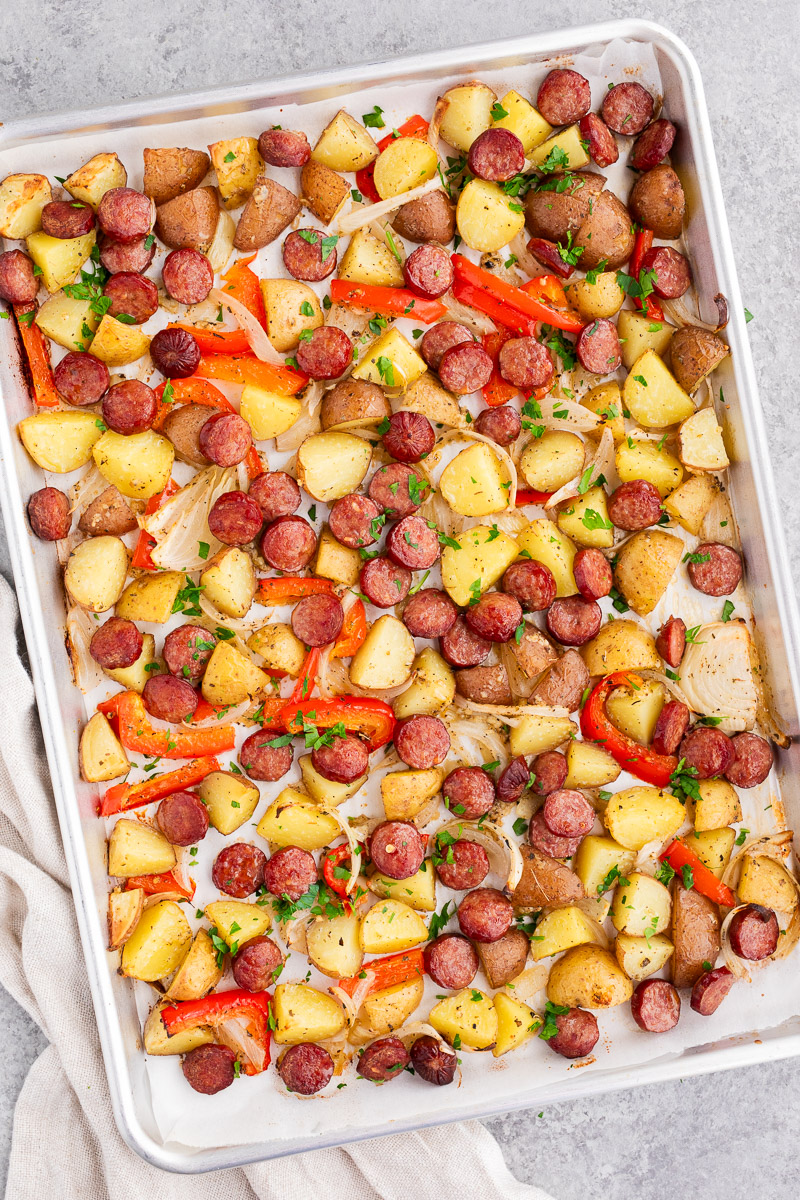 Sheet pan sausage and potatoes with roasted peppers and onions